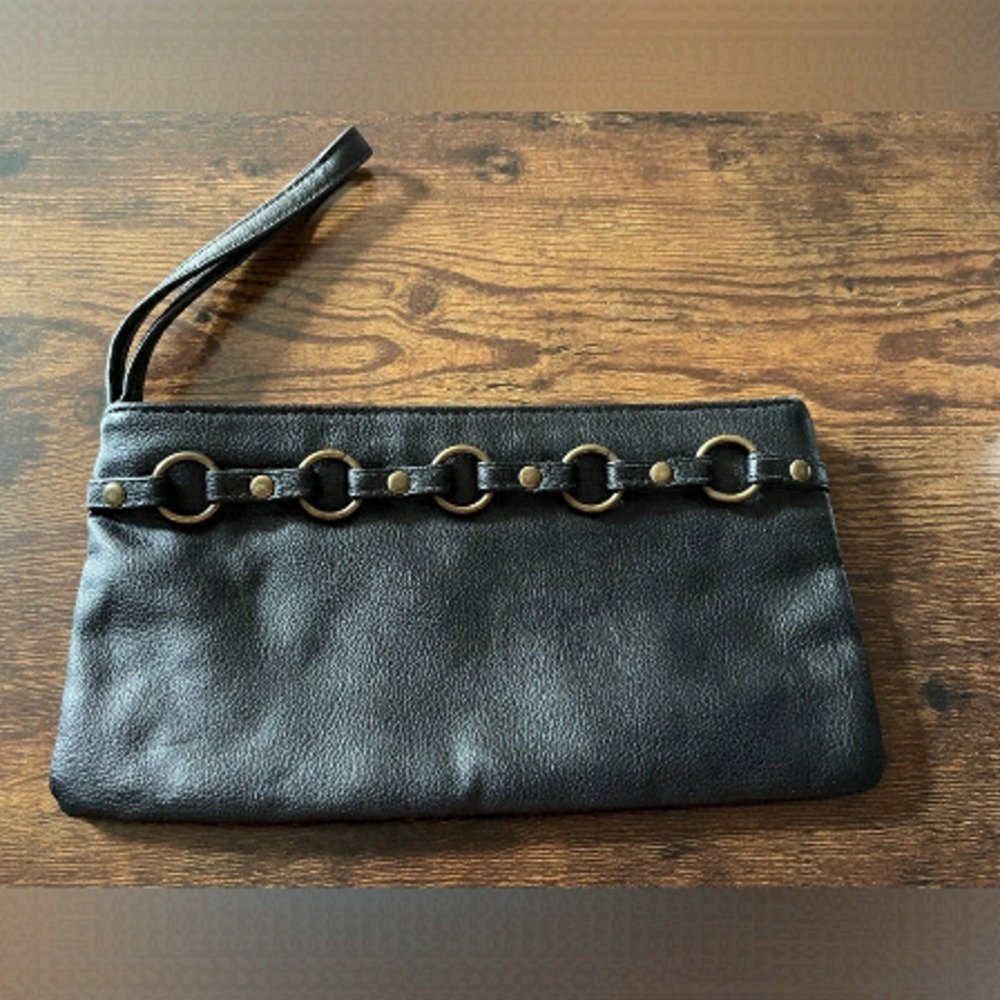 Steve Madden black leather clutch wristlet with metal accents